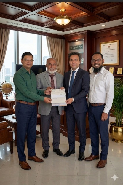 Handing over a Motor Insurance claim cheque to Mr. Shariful Islam Shiblu, GM of Ispahani Tea Ltd., Chattogram.